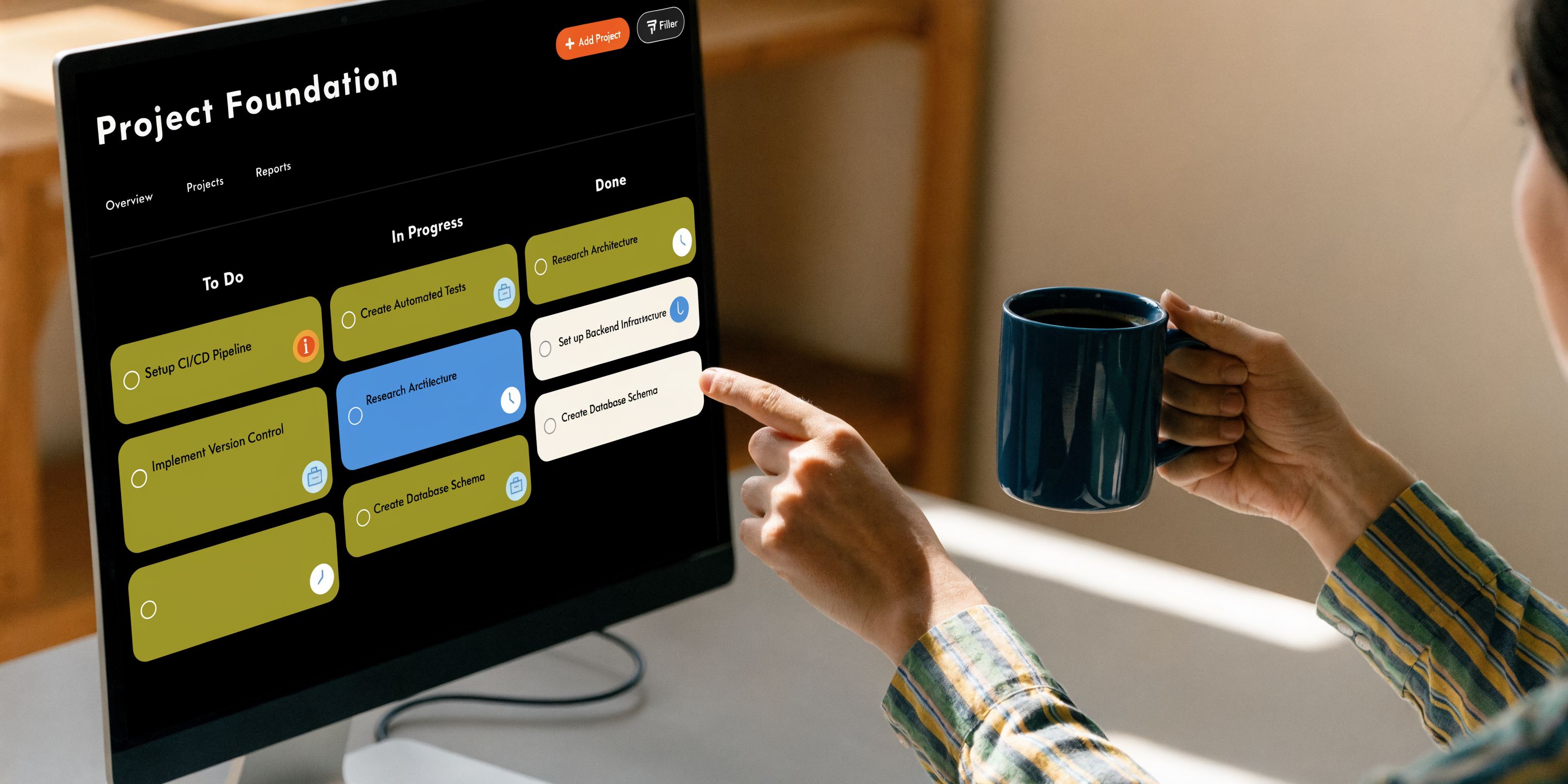 A person pointing at a Kanban board on a computer screen displaying various project management tasks.